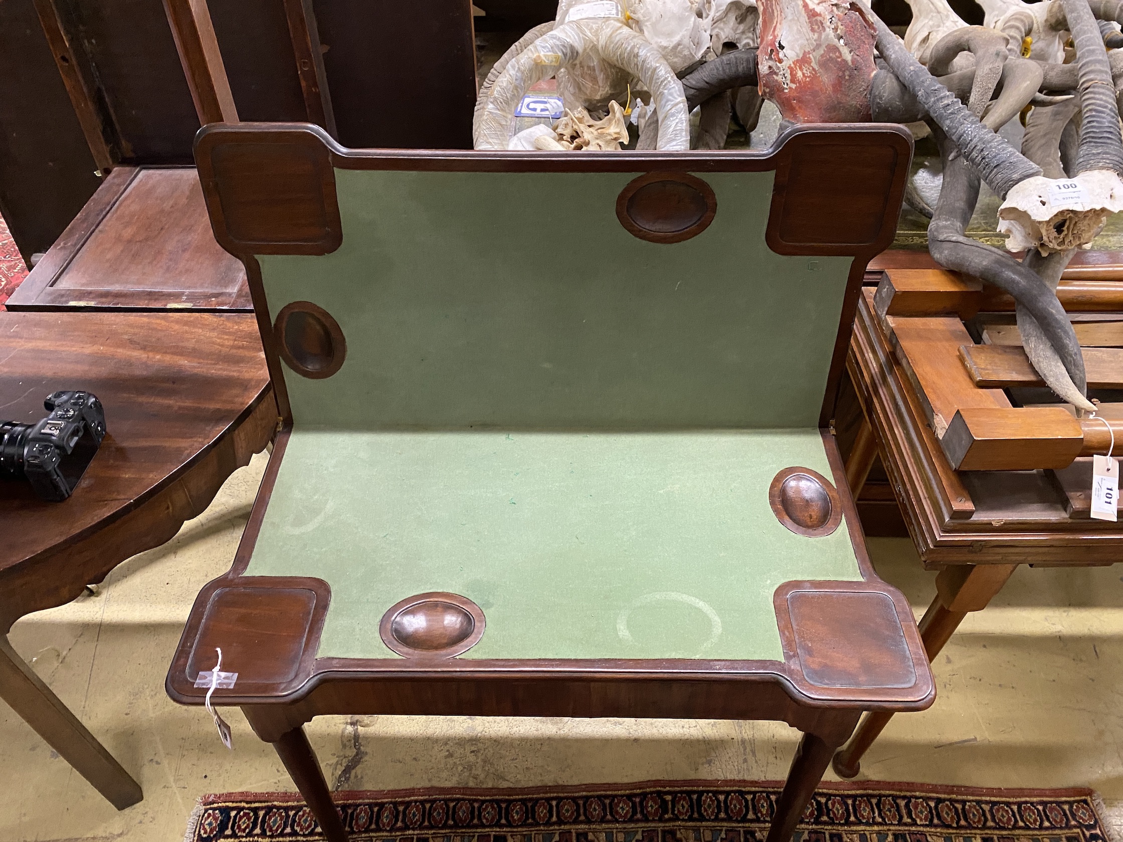 A George III rectangular mahogany folding card table, width 84cm, depth 42cm, height 71cm